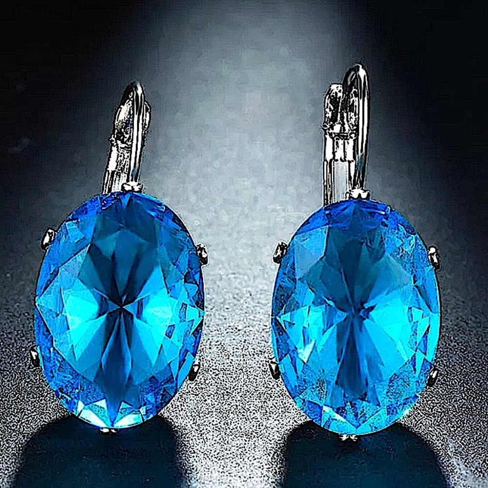 Blue Topaz Silver Oval Dangle Earrings